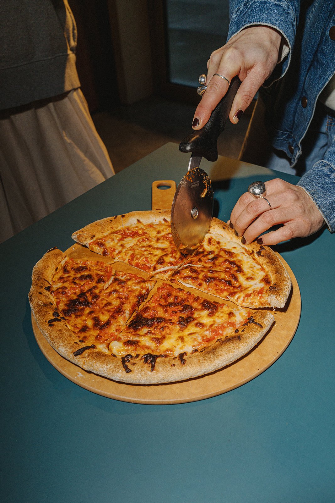 Fresh pizza ready to share at A-STAY