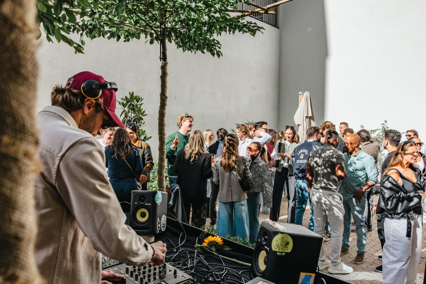 A-STAY Club Matinée event with DJ and guests in the courtyard